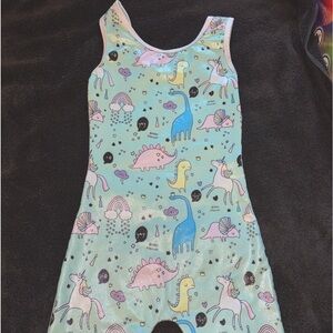 Girls shorts leotard, shimmery with dinosaurs. Size large